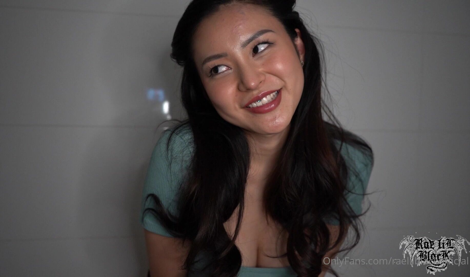 Rae Lil Black Secretly Sucks On A Dildo