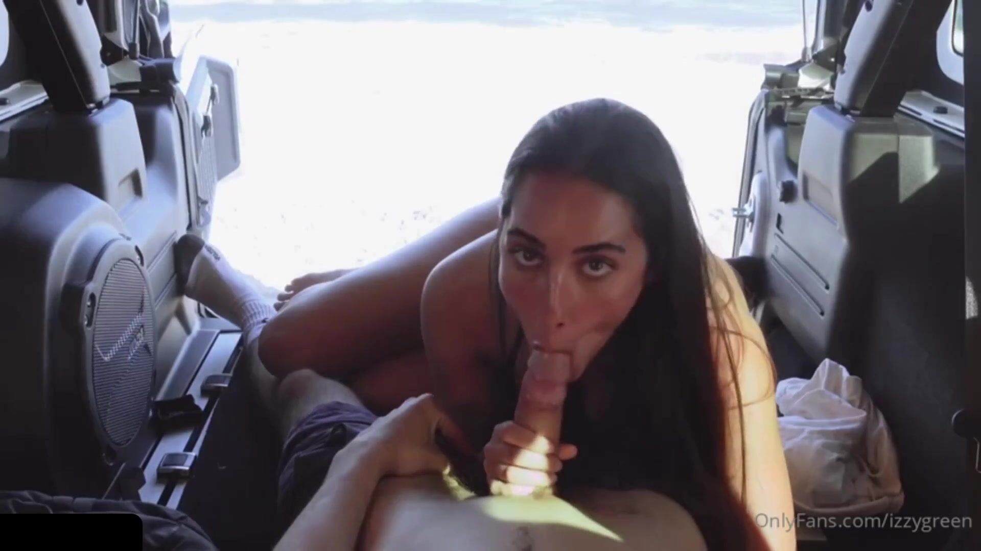 Izzy Green Gives A Blowjob While In The Beach